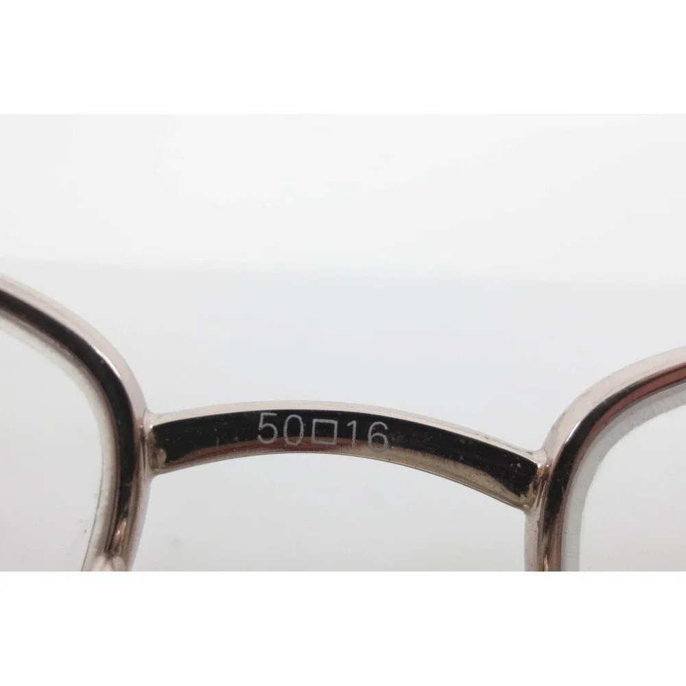 Signature 1111 Coralville Eyeglasses Lt Peach Metal Oval Semi-Rimless 50-16-135